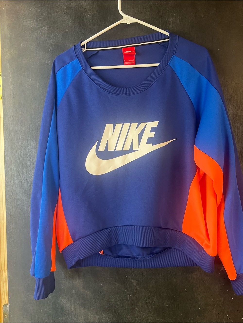 Nike Women's Blue Crewneck Sweatshirt with Orange Accents
